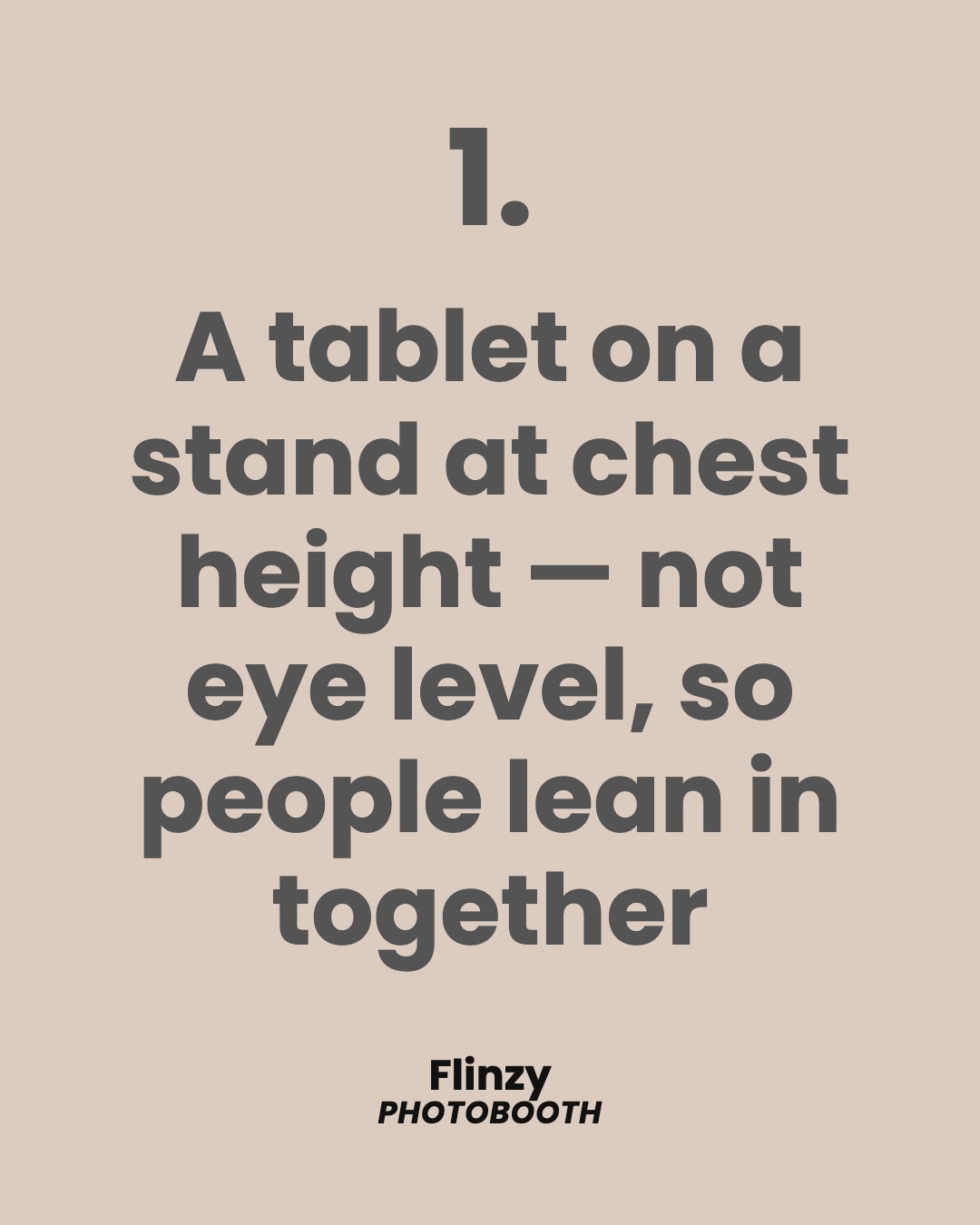 A tablet on a stand at chest height — not eye level, so people lean in together